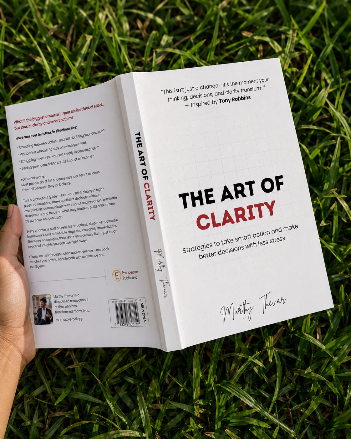 The Art of Clarity by Murthy Thevar, bestselling self-help book photographed outdoors in nature The Art of Clarity by Murthy Thevar, bestselling self-help book photographed outdoors in nature